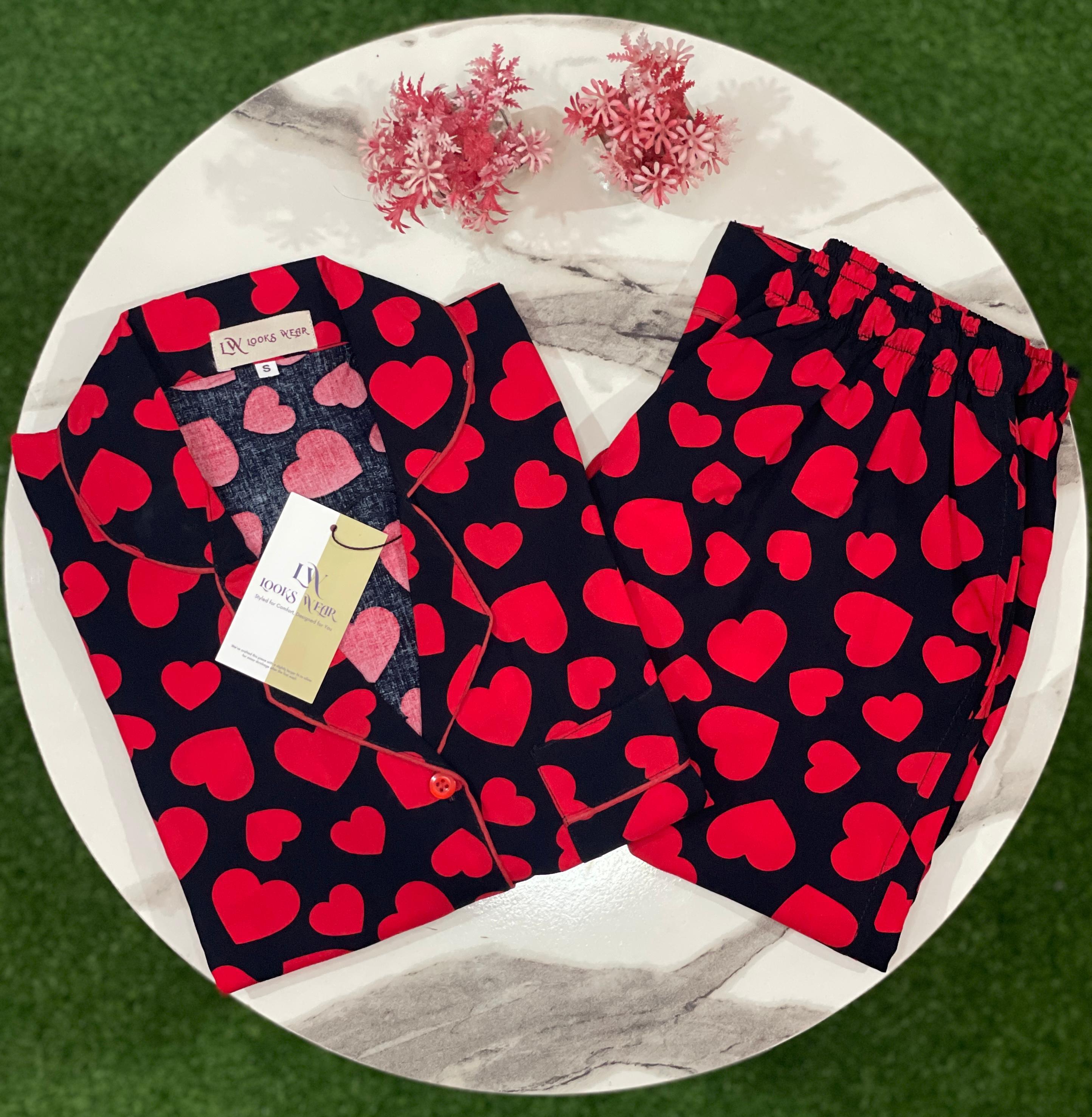 Red heart on black fabric