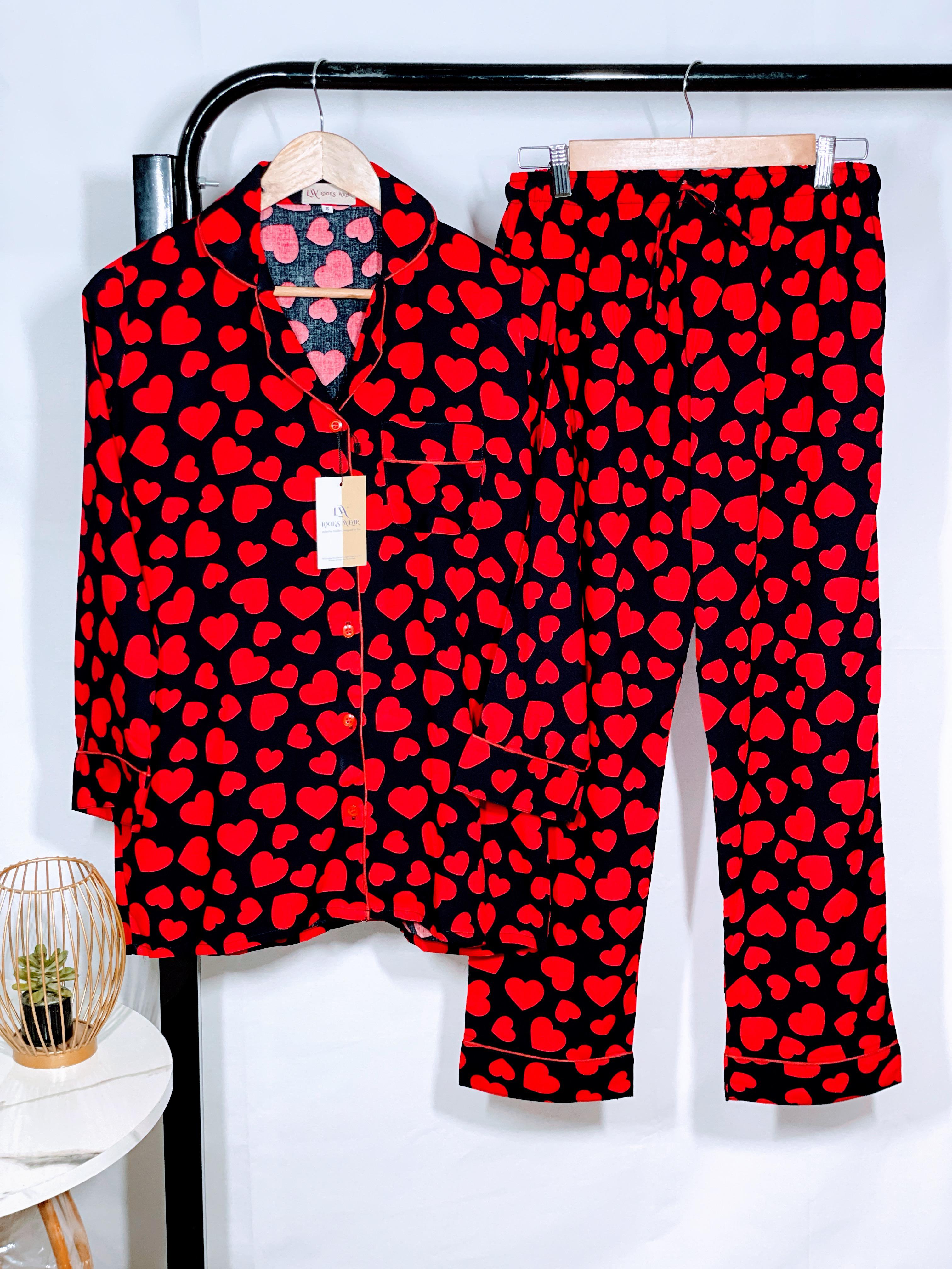 Red heart on black fabric